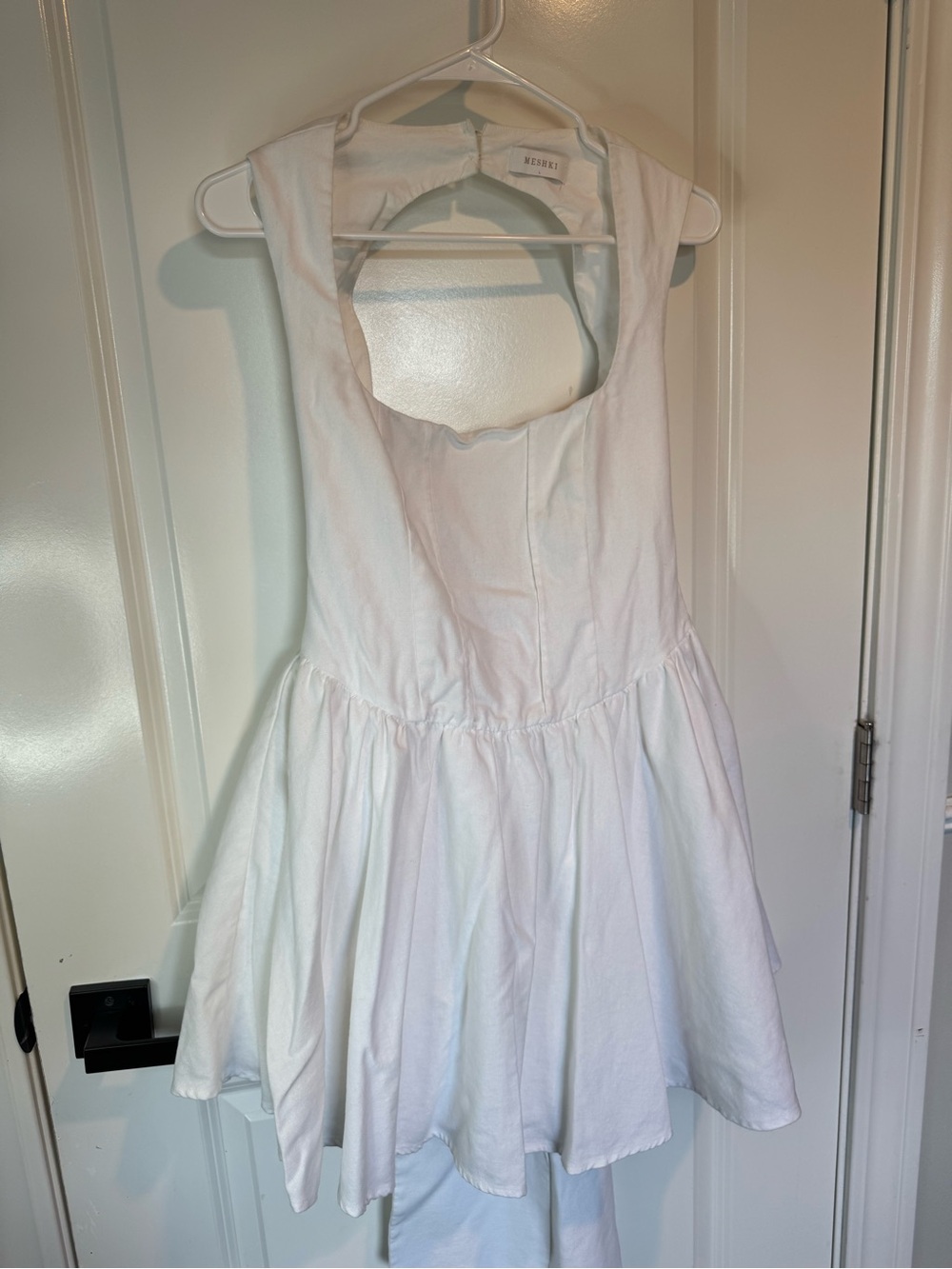 Meshki White Sleeveless Dress with Scoop Back and large bow